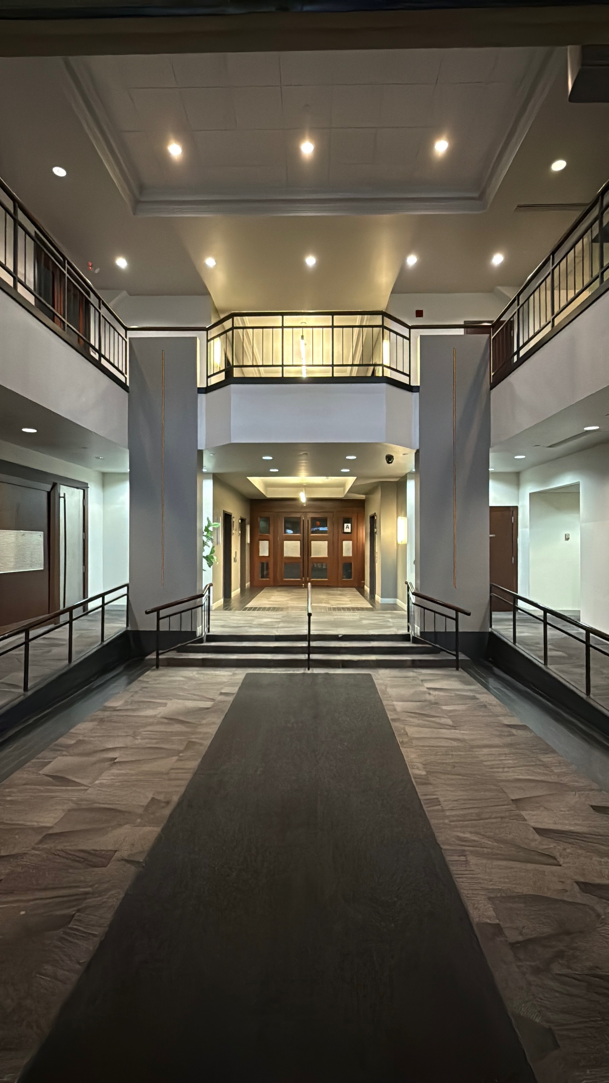 Atrium interior, centered view toward main doors